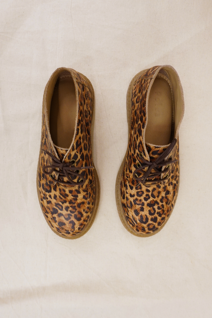 botin cuero animal print