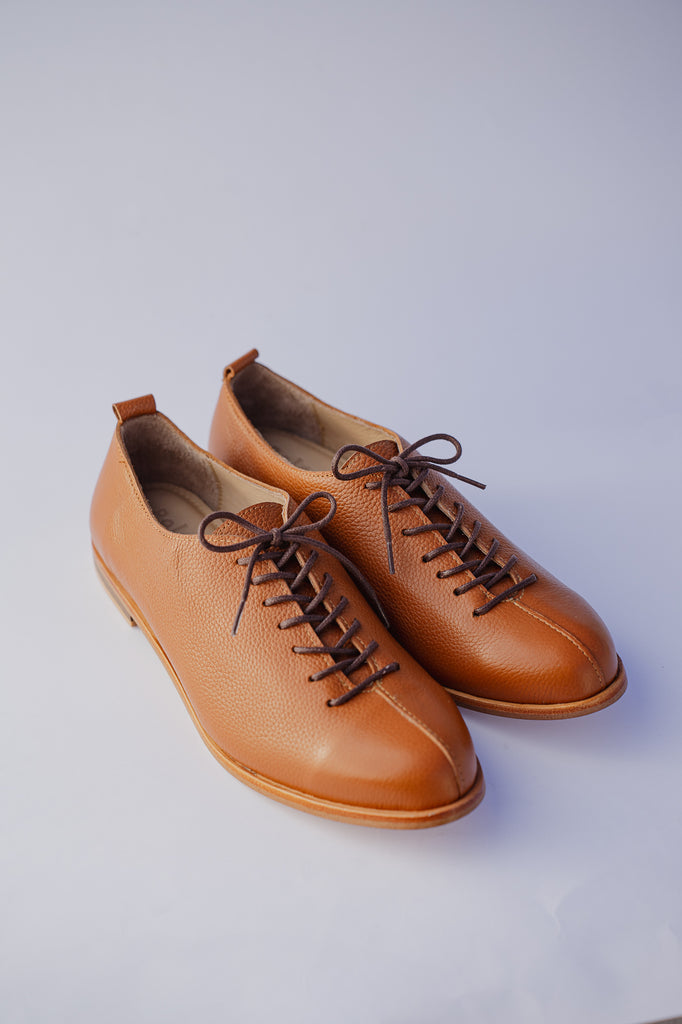 zapatos bajos de cuero