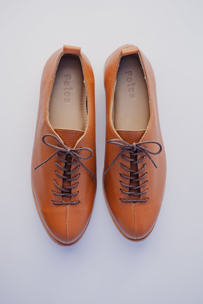 zapatos de cuero tipo oxford